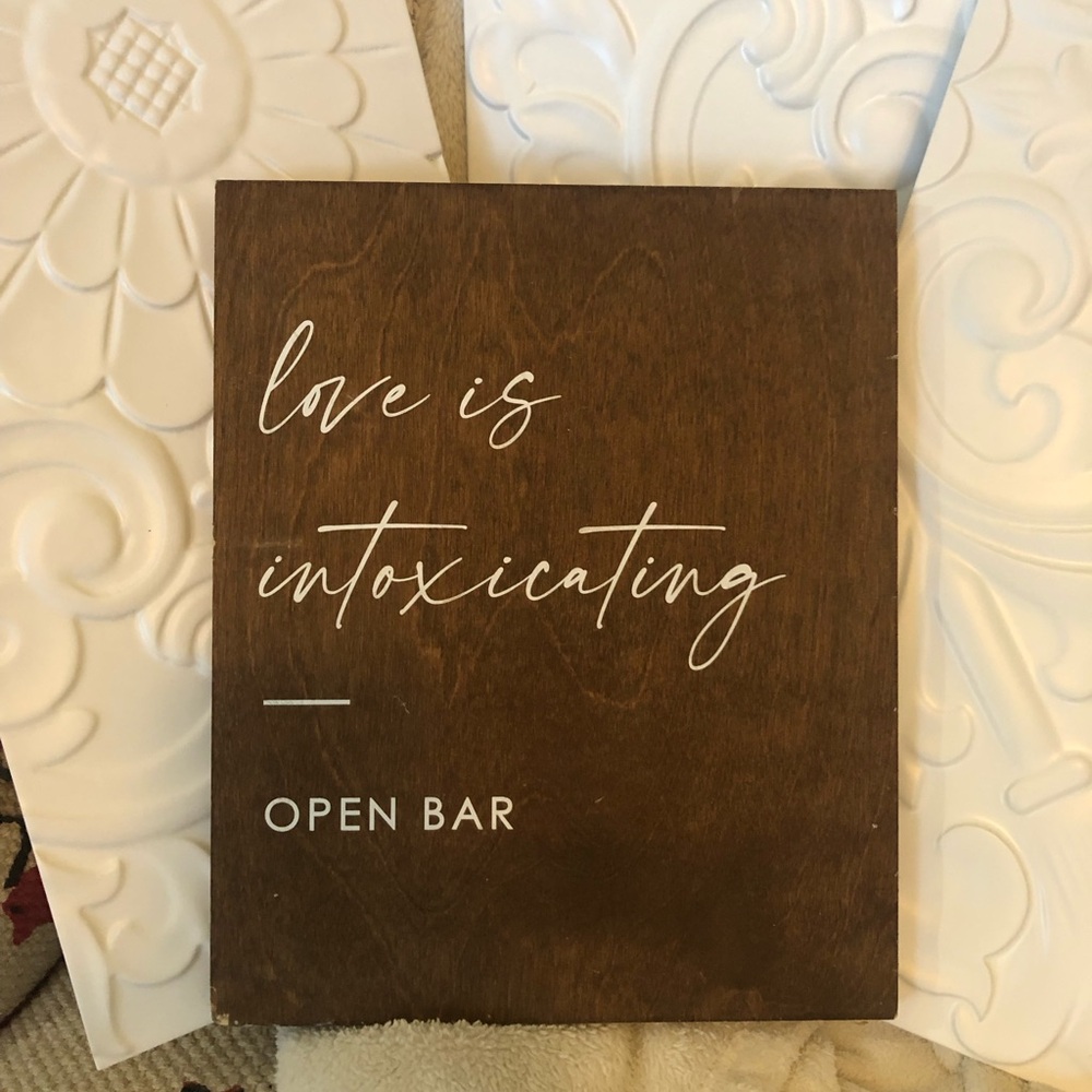 Brown Wooden Bar Sign with White Text